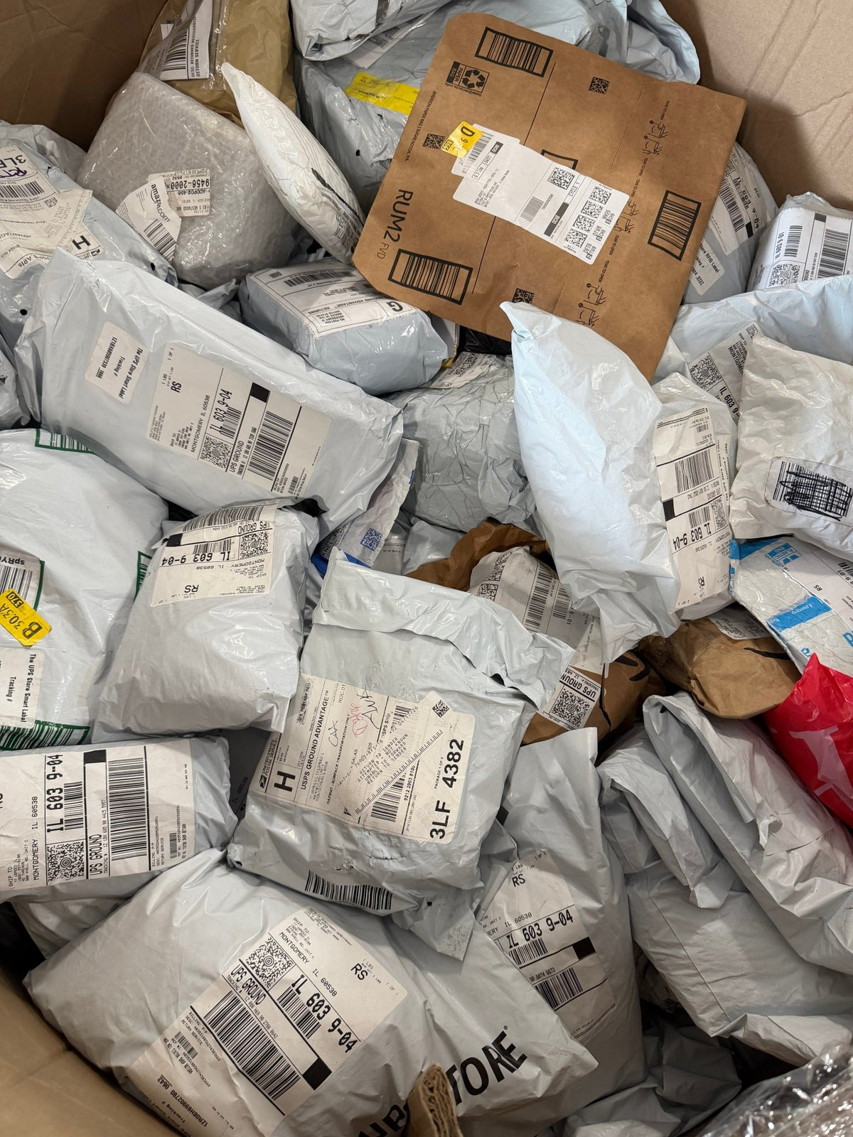 Full Pallet of Mixed Unclaimed Mail - Blue Bird Liquidation