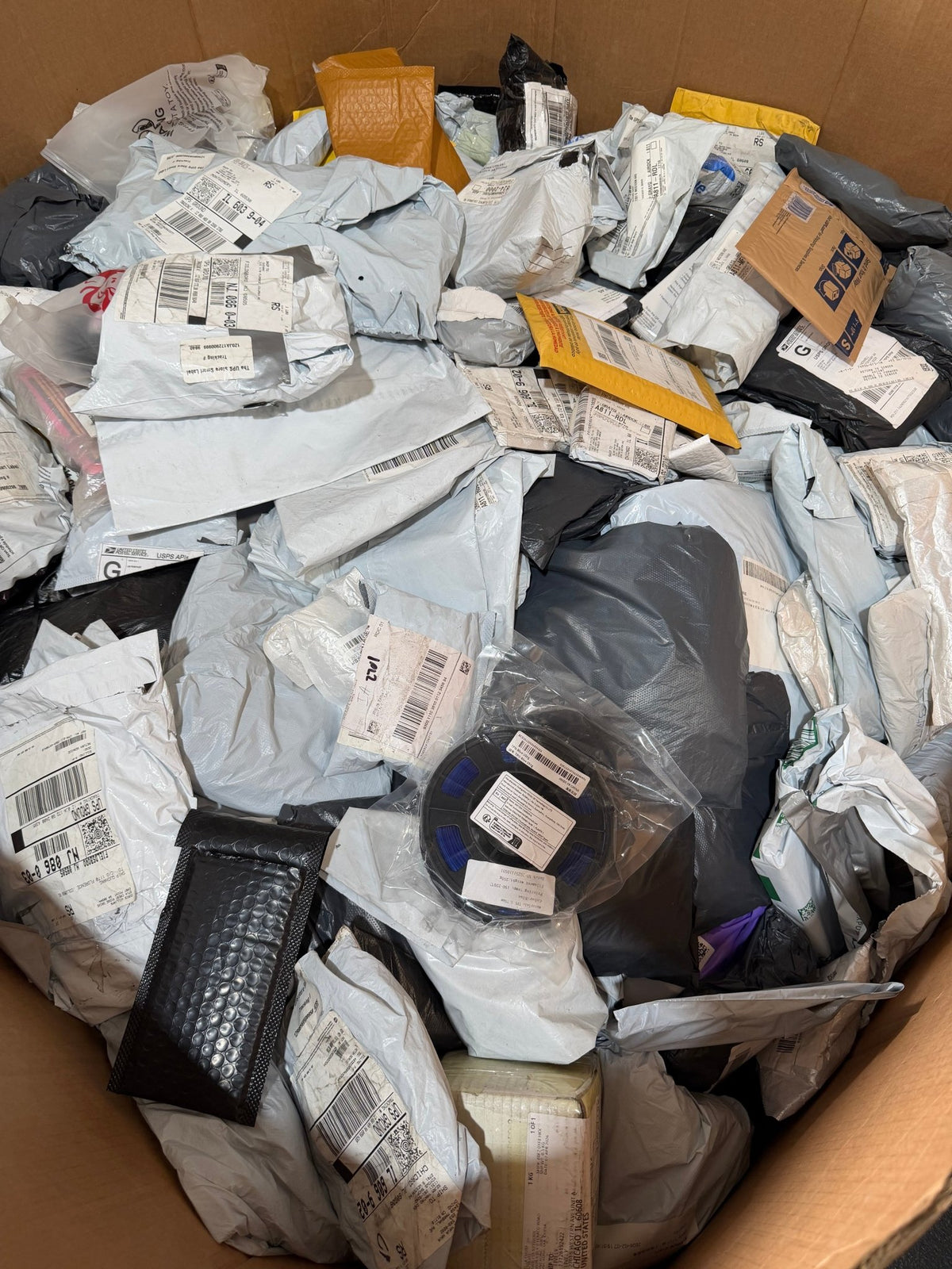 Full Pallet of Mixed Unclaimed Mail - Blue Bird Liquidation